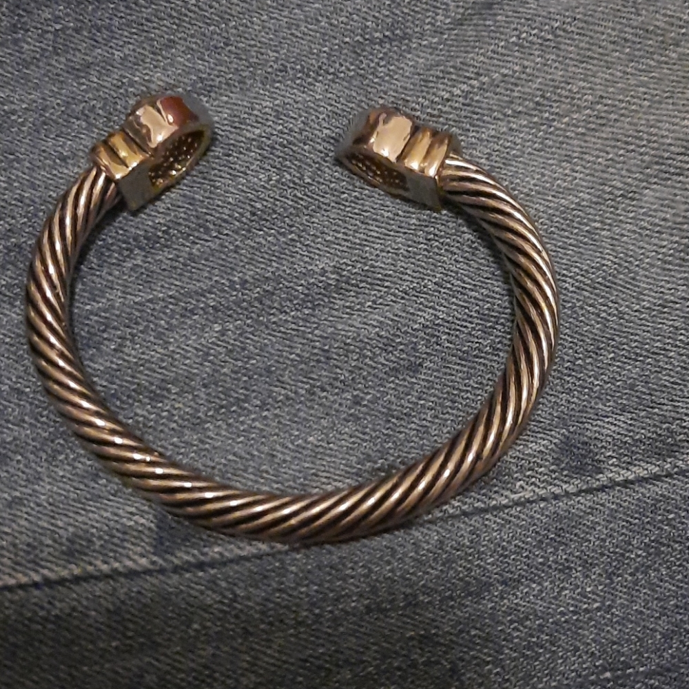 Bangle style silver tone bracelet